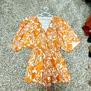 Orange and cream size small Pink Lily romper.  Worn for one vacation.
